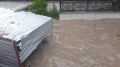 ЧП в Симферополе: ливень смыл в реку Салгир строительный вагончик с мужчиной «на борту»