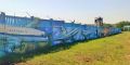 Забор топливного склада аэропорта «Симферополь» украсило 270-метровое граффити с самолетами