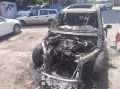 Всё что осталось от авто, сгоревшего этой ночью на парковке супермаркета в Алуште
