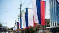 Улицы Симферополя украсили российскими триколорами